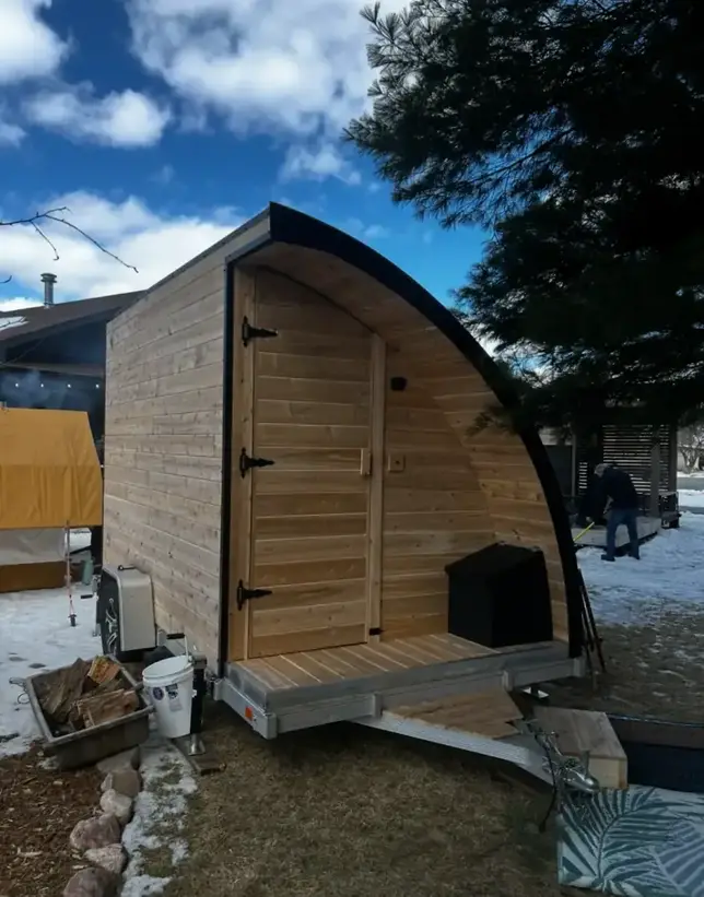The Cedar Arch - Premium mobile sauna rental with cedar construction and wood-fired heating