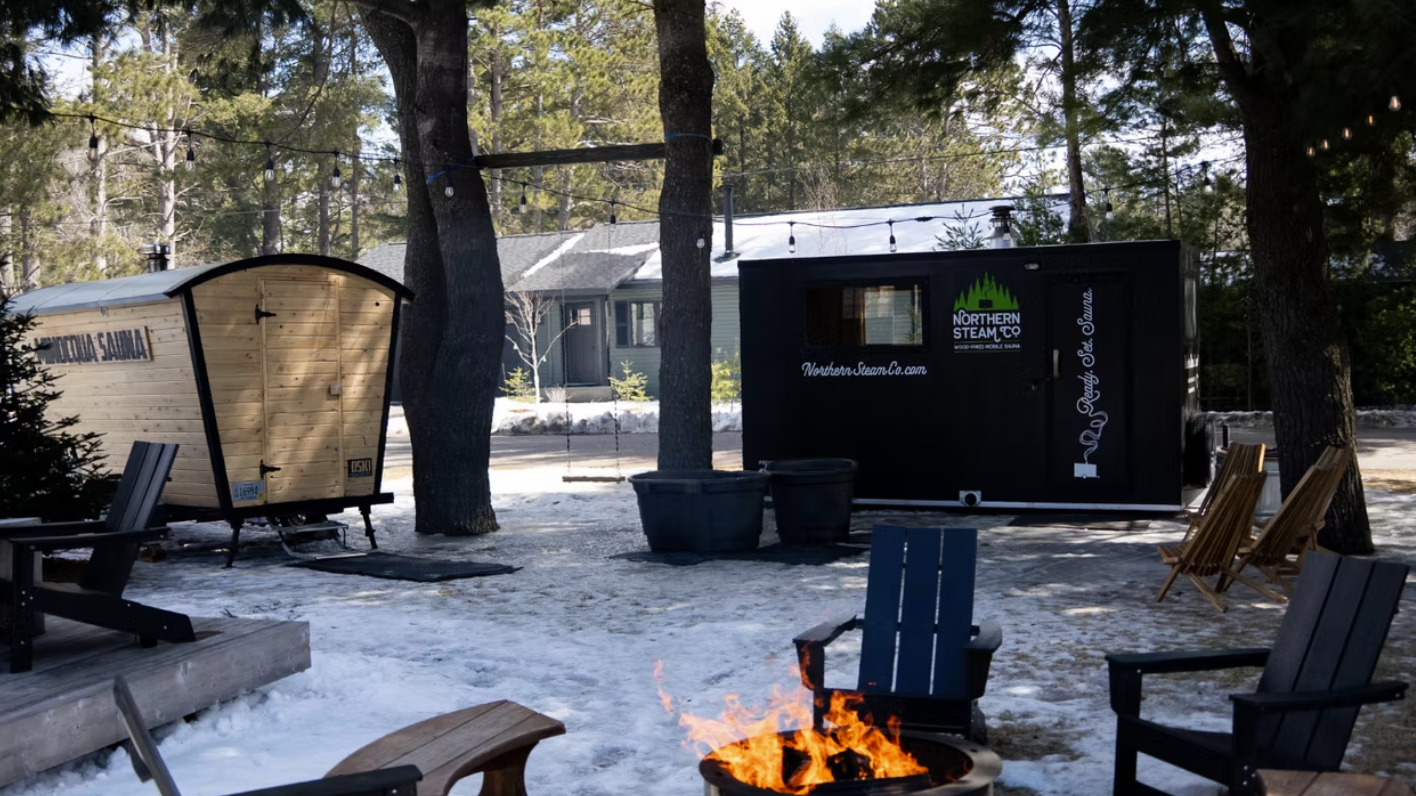 Mobile saunas and fire pit in the snow